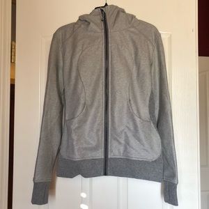 Lululemon zip-up hooded light gray jacket. Size 6.